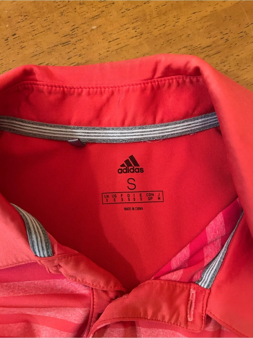 adidas Men’s Coral Red Polo with Navy Stripe
